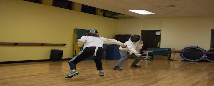 Fencing students practicing.
